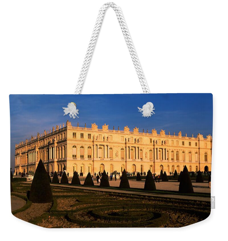 Photography Weekender Tote Bag featuring the photograph Formal Garden In Front Of A Castle by Panoramic Images