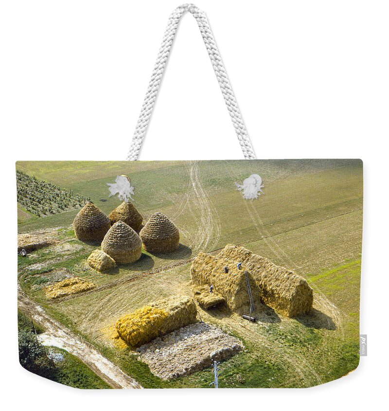 Farm Weekender Tote Bag featuring the photograph French Haystacks by Chuck Staley