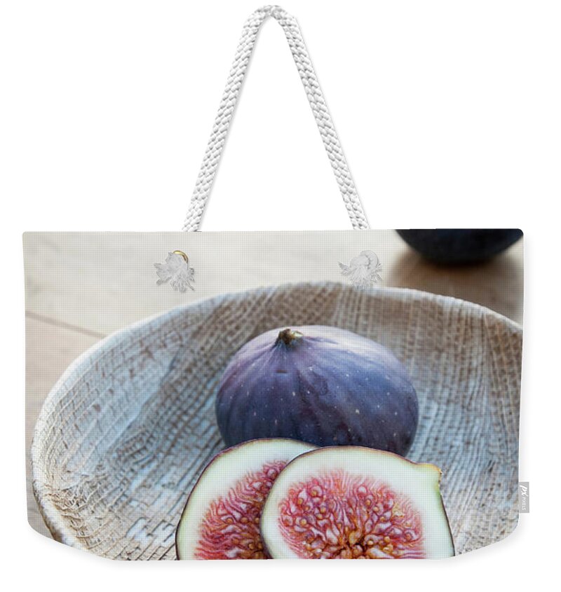 Wood Weekender Tote Bag featuring the photograph Fresh Figs In Wooden Bowl by Luka