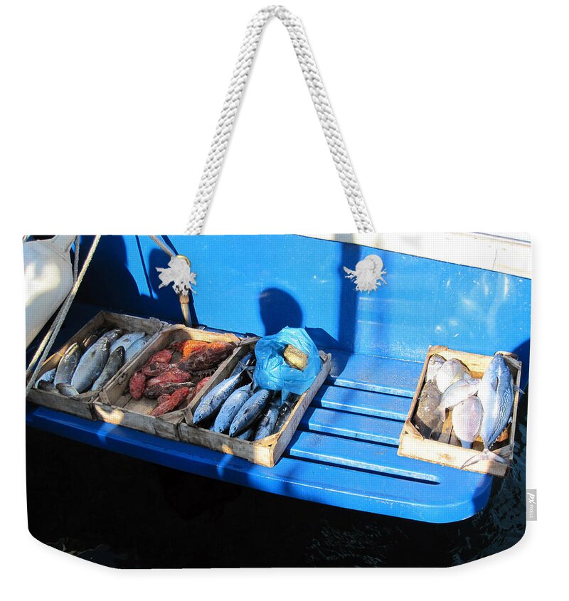 Alexandros Daskalakis Weekender Tote Bag featuring the photograph Fresh Fish in Hydra by Alexandros Daskalakis