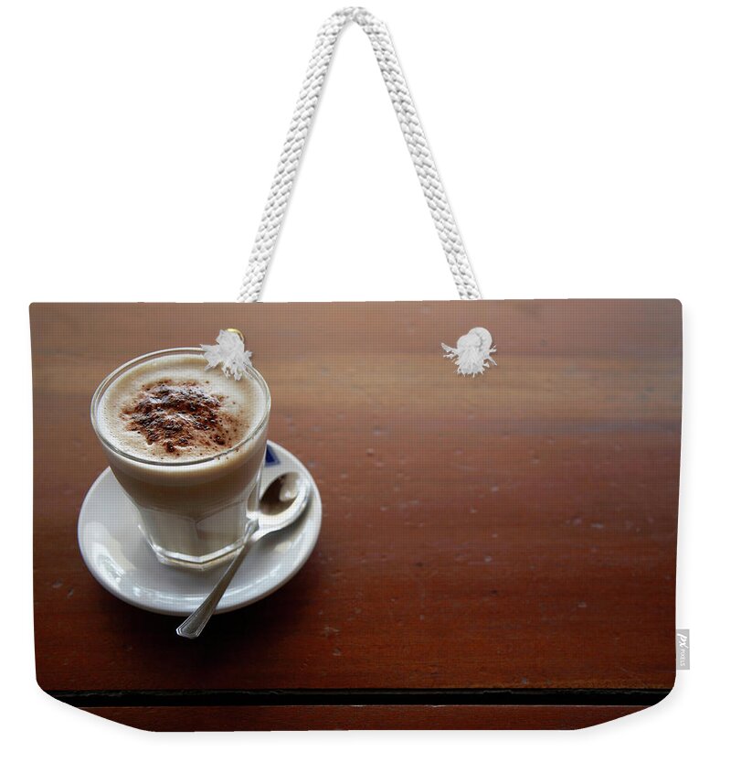 Veneto Weekender Tote Bag featuring the photograph Fresh Latte Coffee On A Rustic Cafe by Andrew Bret Wallis