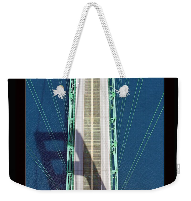 Mackinac Bridge Weekender Tote Bag featuring the photograph From the Top by Jackson Pearson