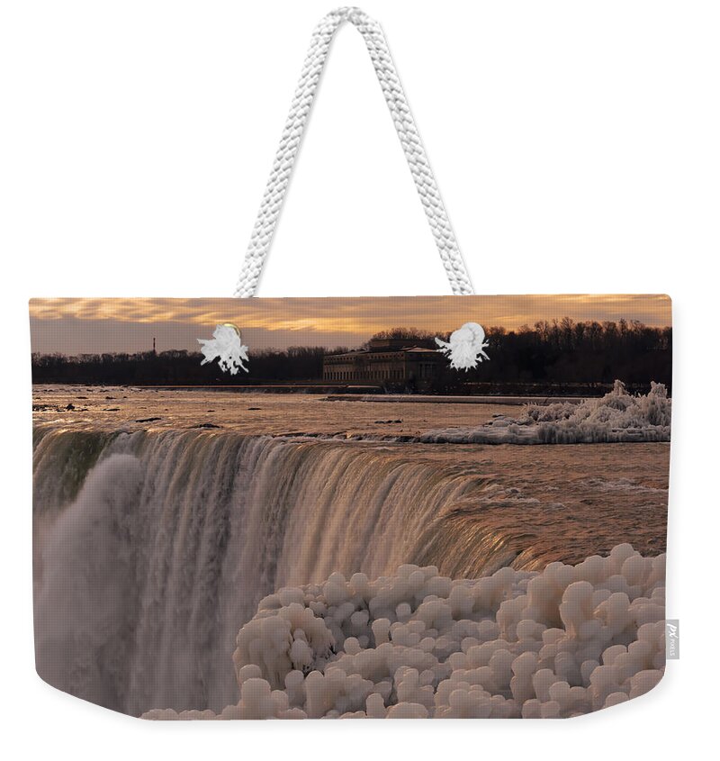 Niagara Falls Weekender Tote Bag featuring the photograph Frozen Falls by Hany J