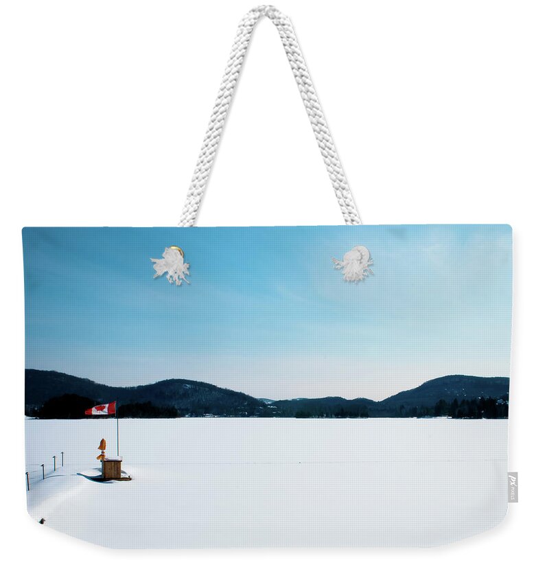 Scenics Weekender Tote Bag featuring the photograph Frozen Lake In Canada by Haja Rasambainarivo