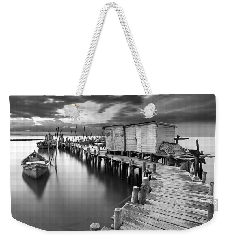 Pier Weekender Tote Bag featuring the photograph Frozen melody by Jorge Maia