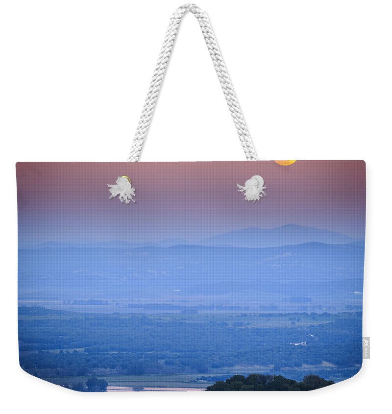 Andalucia Weekender Tote Bag featuring the photograph Full Moon Over Vejer Cadiz Spain by Pablo Avanzini