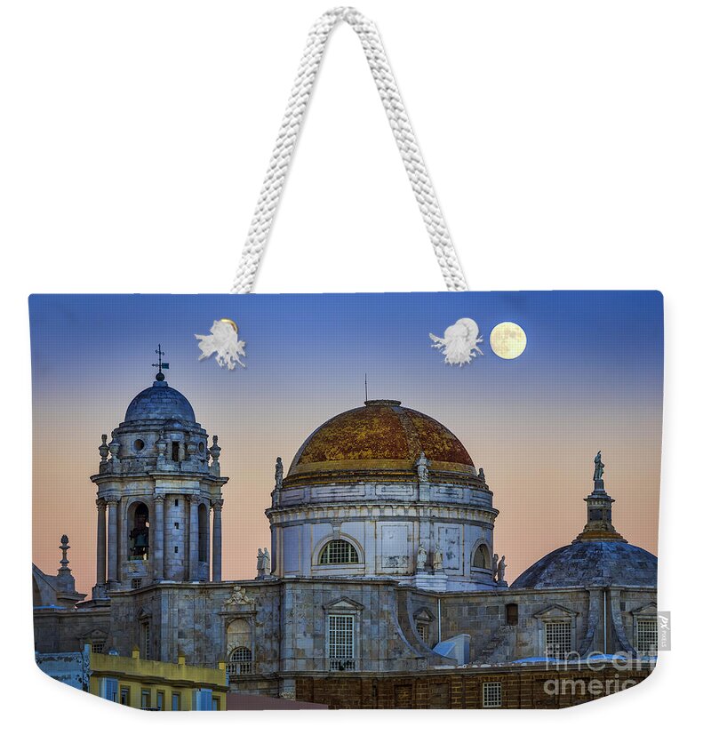 Andalucia Weekender Tote Bag featuring the photograph Full Moon Rising Over the Cathedral Cadiz Spain by Pablo Avanzini