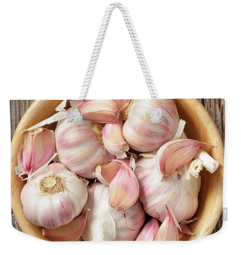 Wood Weekender Tote Bag featuring the photograph Garlic by Riou