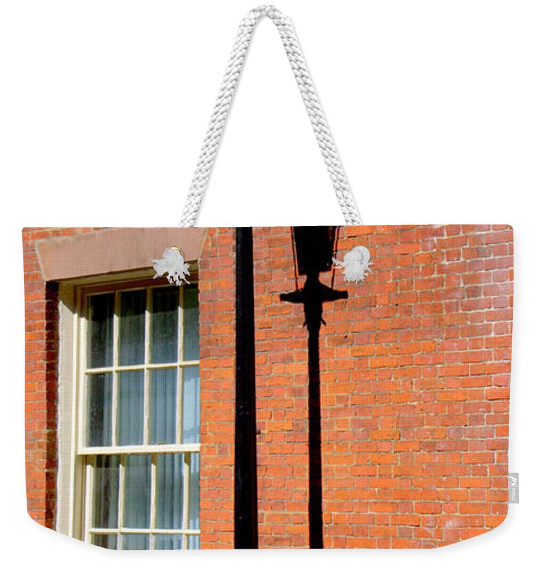 Boston Weekender Tote Bag featuring the photograph Gas Lamp and Shadow by Caroline Stella