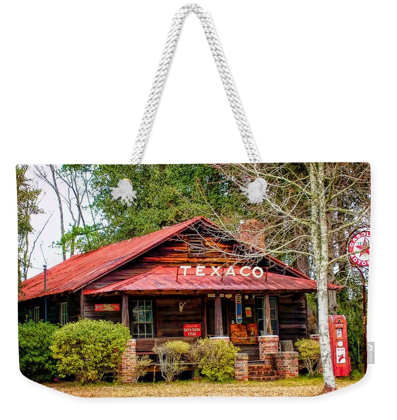 Gas Station Weekender Tote Bag featuring the photograph Gas Station 1 by Dawn Eshelman