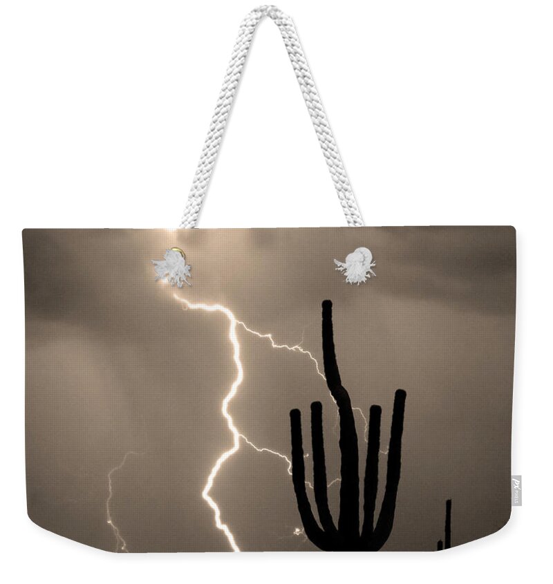 Weather Weekender Tote Bag featuring the photograph Giant Saguaro Cactus Lightning Strike Sepia by James BO Insogna