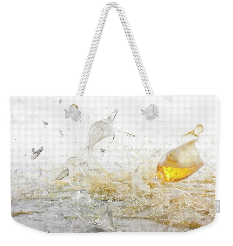White Background Weekender Tote Bag featuring the photograph Glasses Of Beer Shattering by Fstop Images - Dual Dual