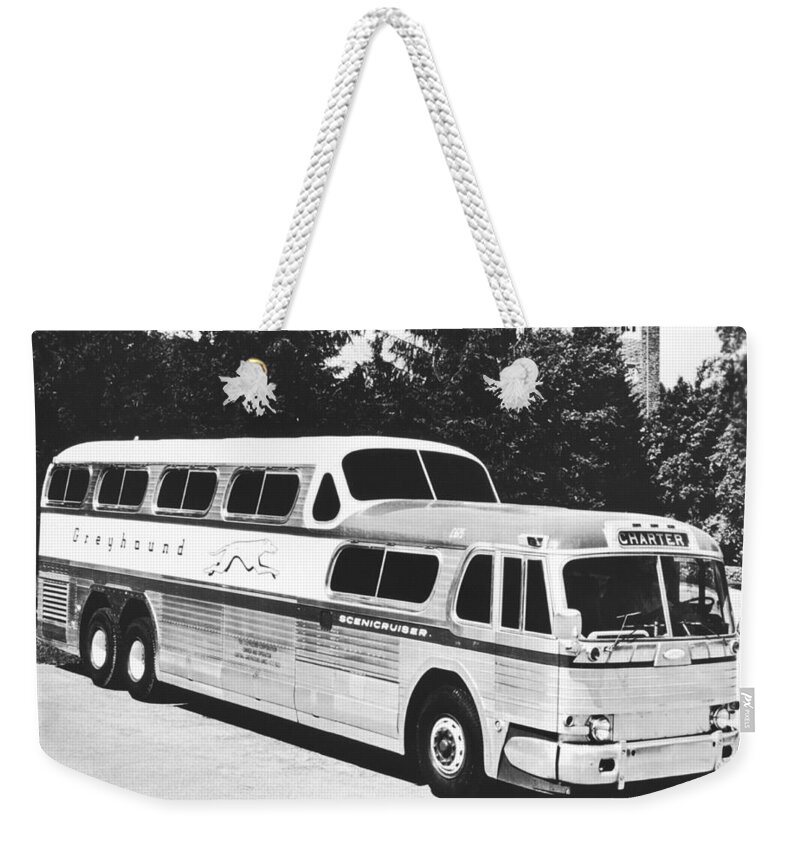 1950's Weekender Tote Bag featuring the photograph GM's Latest Bus Line by Underwood Archives