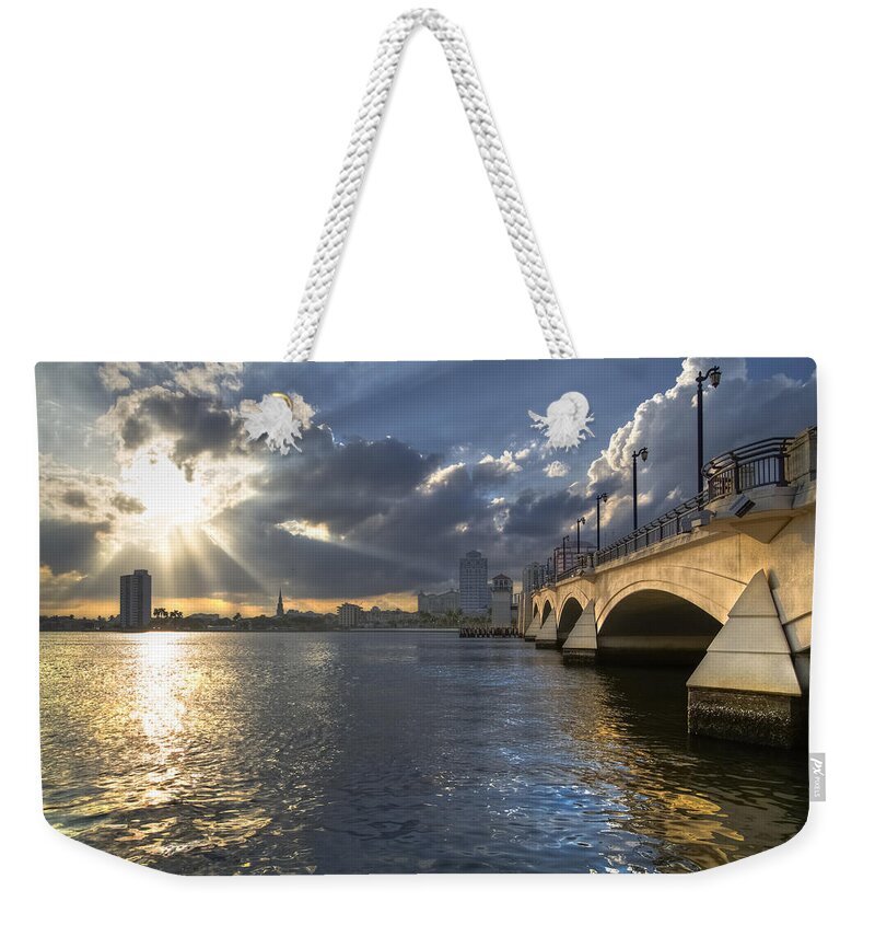 Clouds Weekender Tote Bag featuring the photograph God's Light Over West Palm Beach by Debra and Dave Vanderlaan