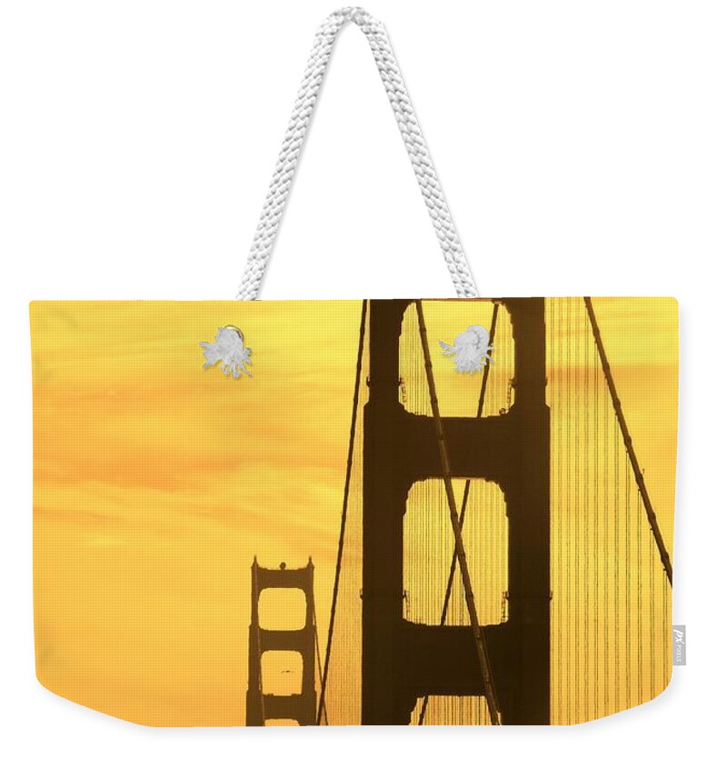 Golden Weekender Tote Bag featuring the photograph Golden Gate Bridge by Clare Bevan