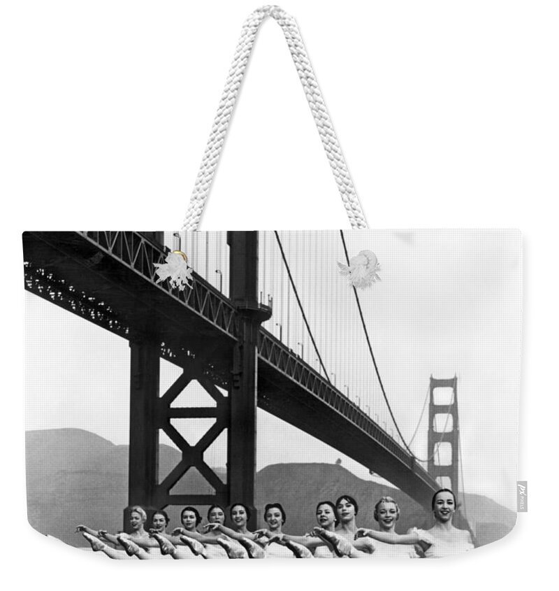 B And W Weekender Tote Bag featuring the photograph Golden Gate Bridge Ballet by Underwood Archives