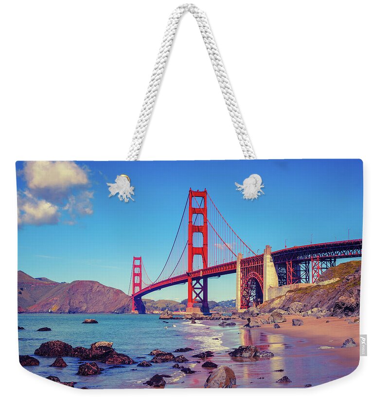 Water's Edge Weekender Tote Bag featuring the photograph Golden Gate Bridge Seen From Baker Beach by Moreiso