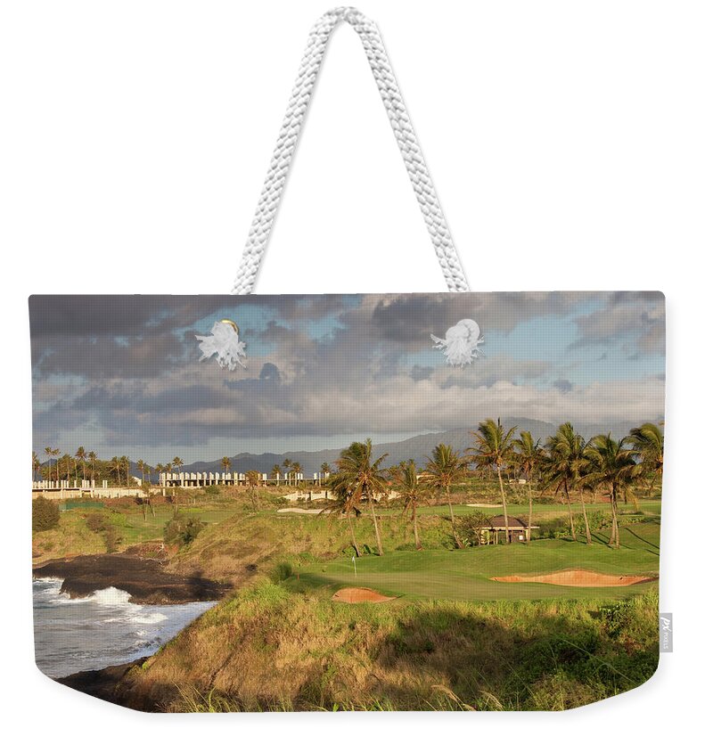 Sand Trap Weekender Tote Bag featuring the photograph Golf Green Along Ocean by Imaginegolf