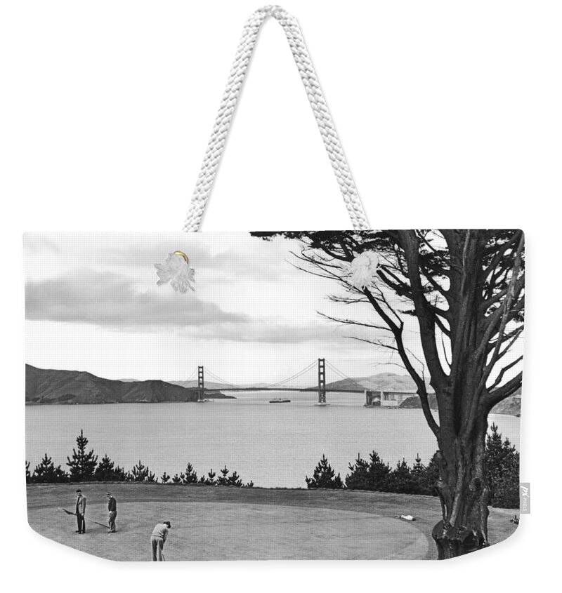 1930's Weekender Tote Bag featuring the photograph Golf With View Of Golden Gate by Ray Hassman