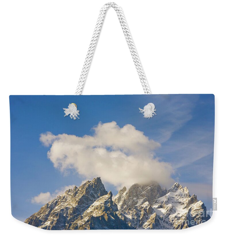 00431126 Weekender Tote Bag featuring the photograph Grand Teton Peak And Cumulus Clouds by Yva Momatiuk and John Eastcott