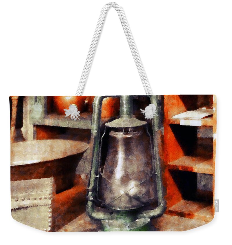 Americana Weekender Tote Bag featuring the photograph Green Hurricane Lamp in General Store by Susan Savad