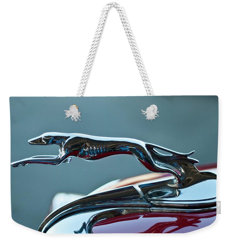 Greyhound Weekender Tote Bag featuring the photograph Greyhound Hood Ornament by Ron Roberts