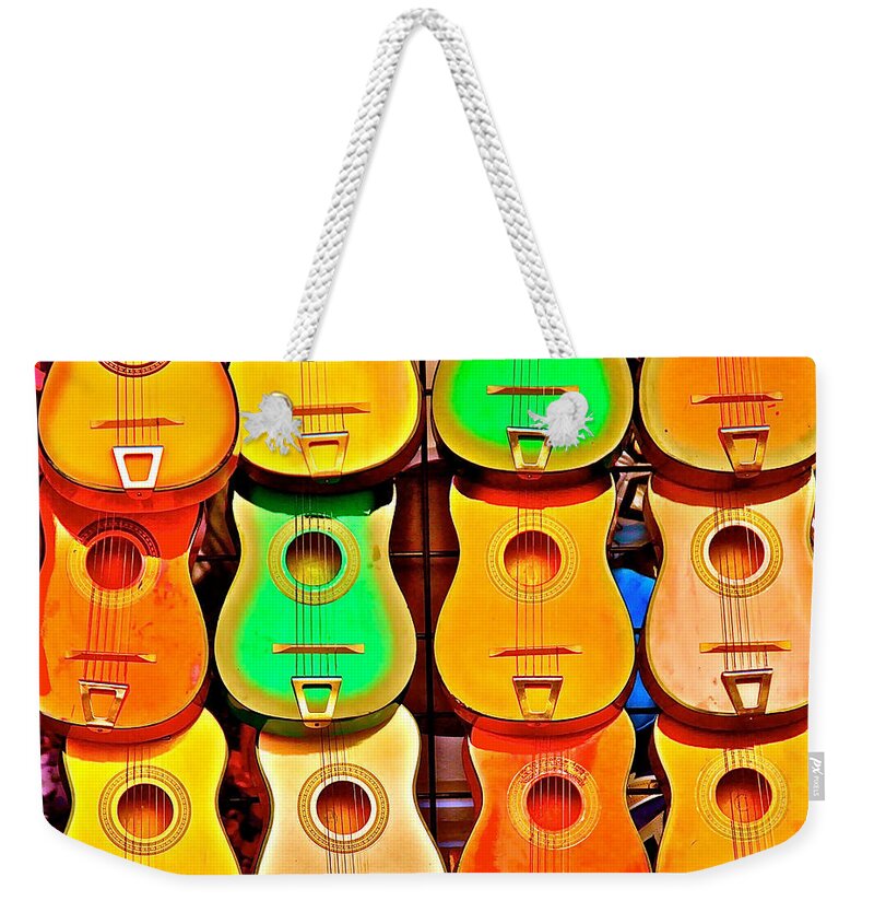 John Illingworth Weekender Tote Bag featuring the photograph Guitars by John Illingworth