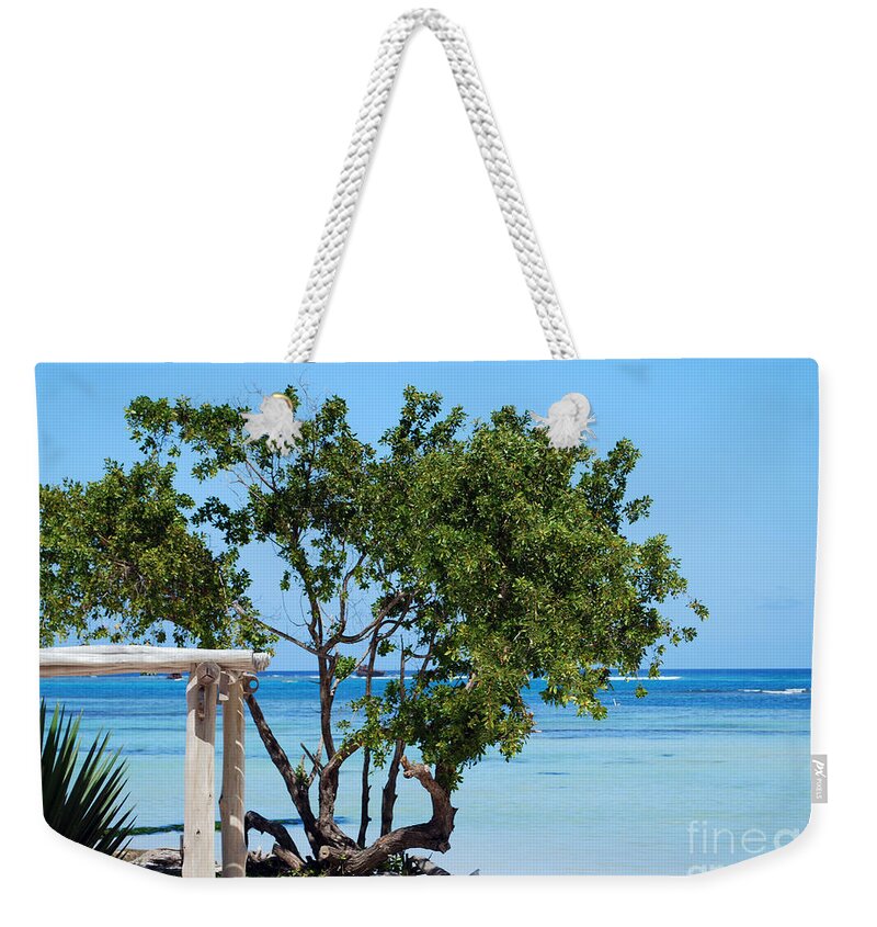 Sea Weekender Tote Bag featuring the photograph Hammock Stand on Playa Blanca Punta Cana Dominican Republic by Heather Kirk