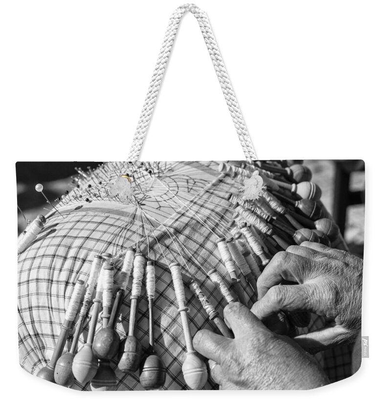 Lace Weekender Tote Bag featuring the photograph Handmade lace work by Paulo Goncalves