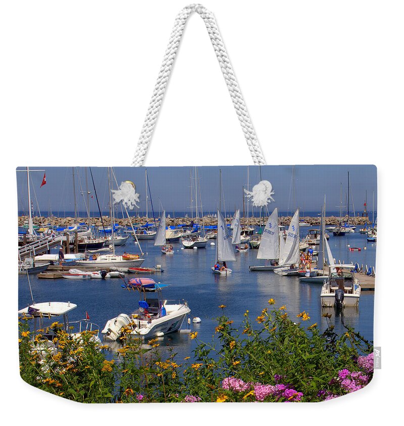 New England Weekender Tote Bag featuring the photograph Harbor in Bloom by Caroline Stella