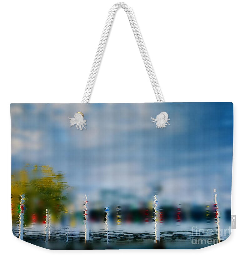Boat Weekender Tote Bag featuring the photograph Harbor Reflections by Michael Arend