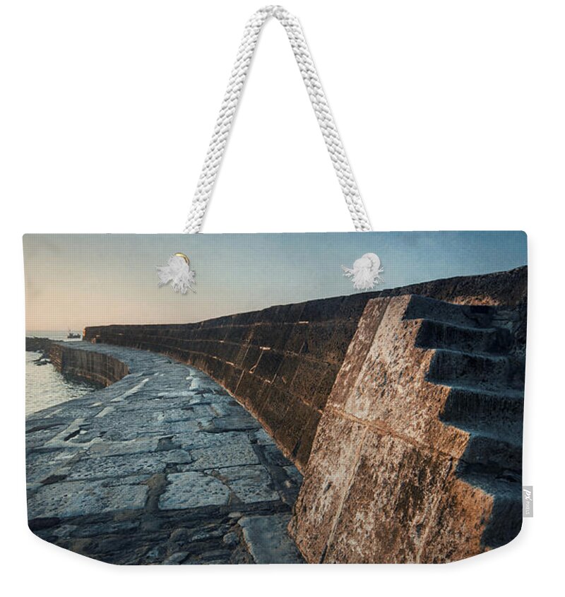 Coast Weekender Tote Bag featuring the photograph Harbour Wall by David Lichtneker