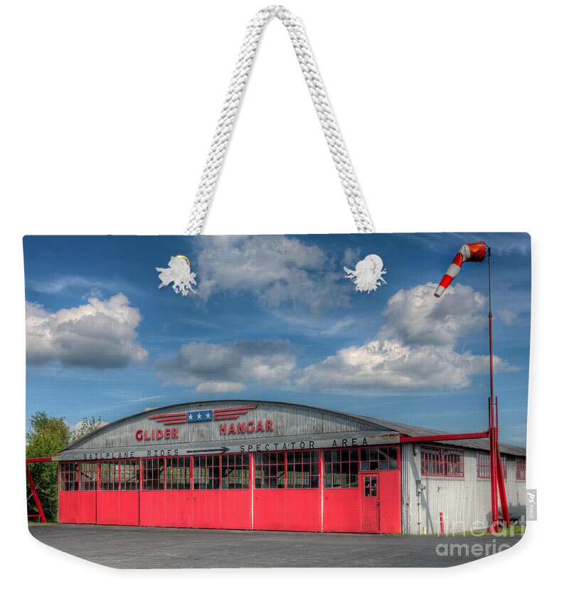 Clarence Holmes Weekender Tote Bag featuring the photograph Harris Hill Glider Hangar I by Clarence Holmes