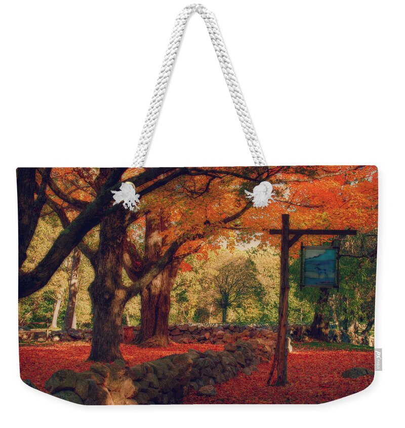 Hartwell Tavern Weekender Tote Bag featuring the photograph Hartwell tavern under orange fall foliage by Jeff Folger