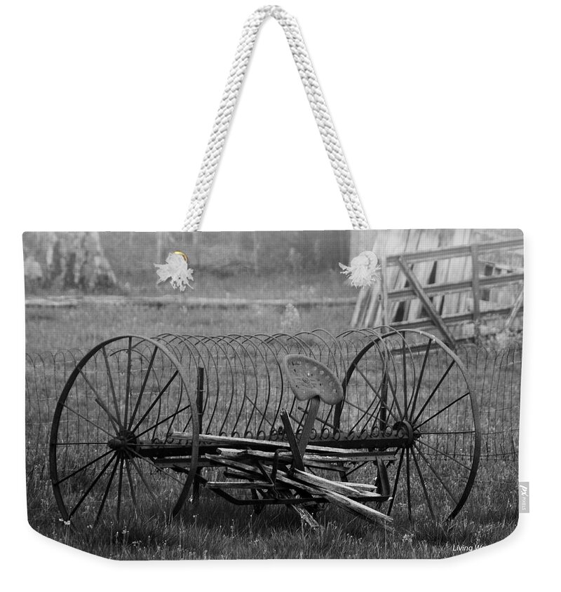 Black And White Weekender Tote Bag featuring the photograph Hay Rake by Eric Liller