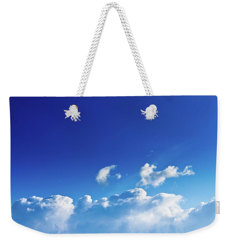 Scenics Weekender Tote Bag featuring the photograph High Altitude Sky With Clouds by Ivanjekic