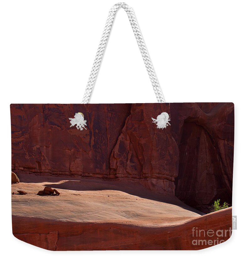 Arches National Park Print Weekender Tote Bag featuring the photograph Hold On by Jim Garrison