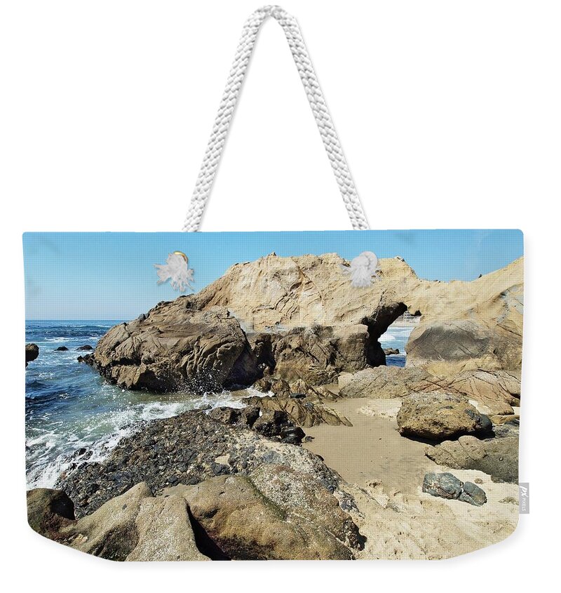 Beach Weekender Tote Bag featuring the photograph Hole in the Rock by Steve Ondrus