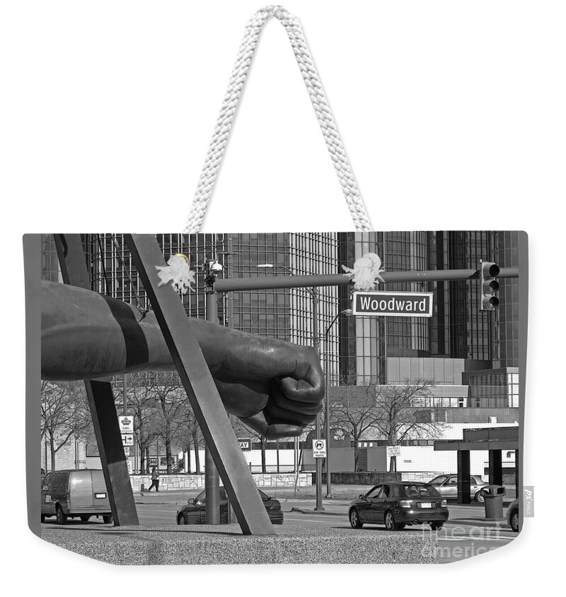 Detroit Weekender Tote Bag featuring the photograph Homage to Joe Louis bw by Ann Horn