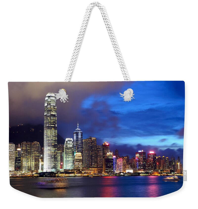 Corporate Business Weekender Tote Bag featuring the photograph Hong Kong Victoria Harbor During Sunset by Ngkaki