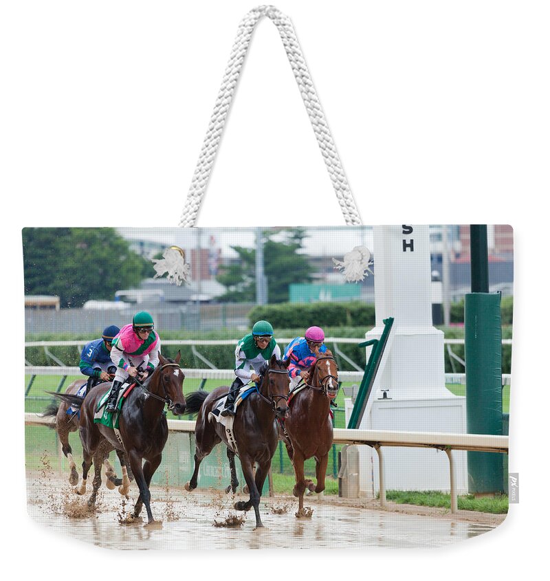 Track Weekender Tote Bag featuring the photograph Horse races at Churchill Downs by Alexey Stiop