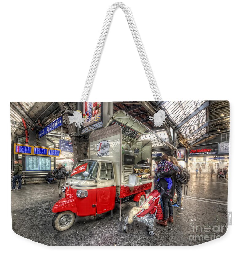 Yhun Suarez Weekender Tote Bag featuring the photograph Hotdog Stand at Hauptbahnhof by Yhun Suarez