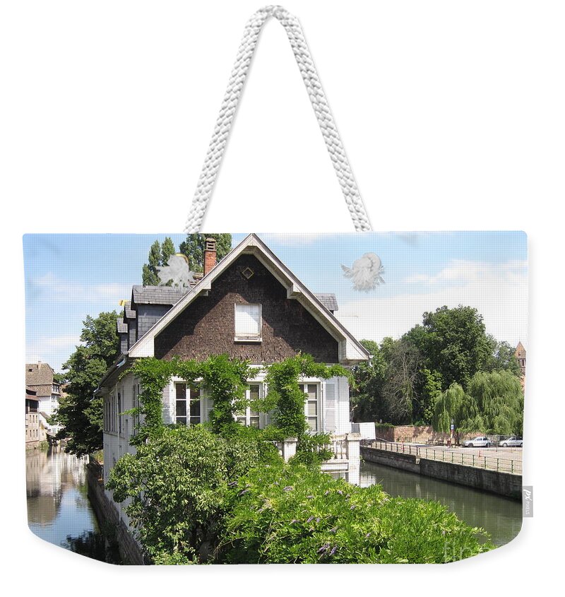 Timber Weekender Tote Bag featuring the photograph House in the middle of the canal by Amanda Mohler