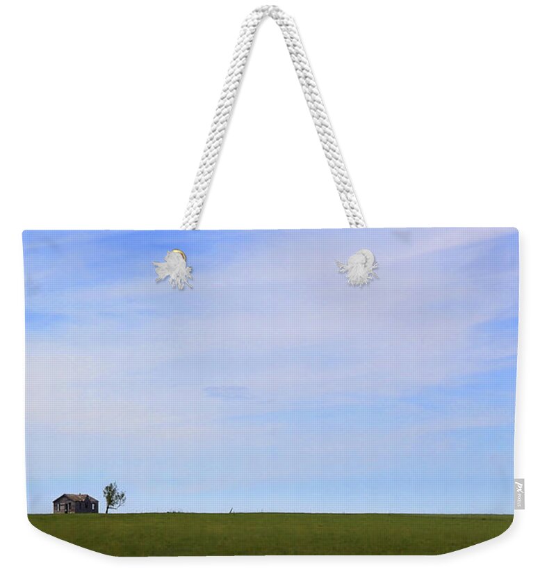 Interesting Clouds Weekender Tote Bag featuring the photograph House on the Hill by Mike McGlothlen
