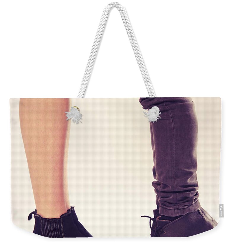 Boot Weekender Tote Bag featuring the photograph How to Kiss a Tall Girl by Carlos Caetano