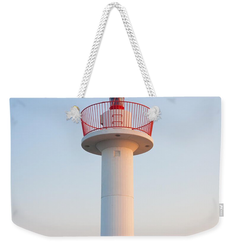 Blue Weekender Tote Bag featuring the photograph Howth Lighthouse Beacon by Semmick Photo