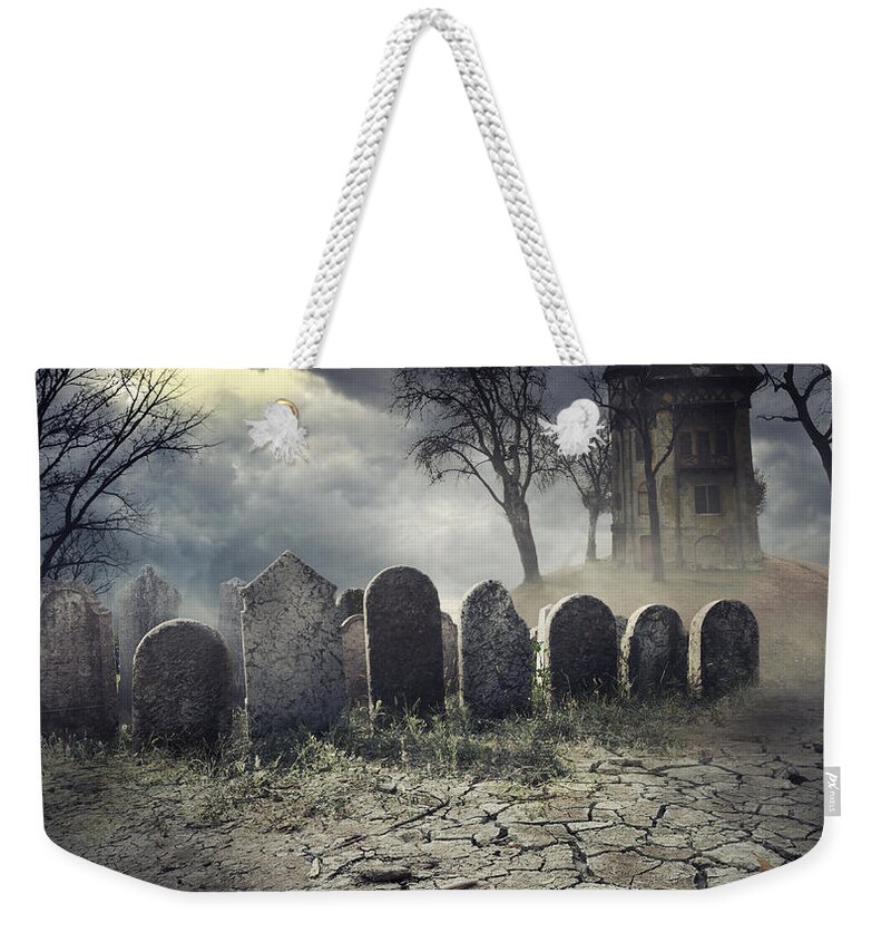 Halloween Weekender Tote Bag featuring the digital art Hunted House on graveyard by Jelena Jovanovic