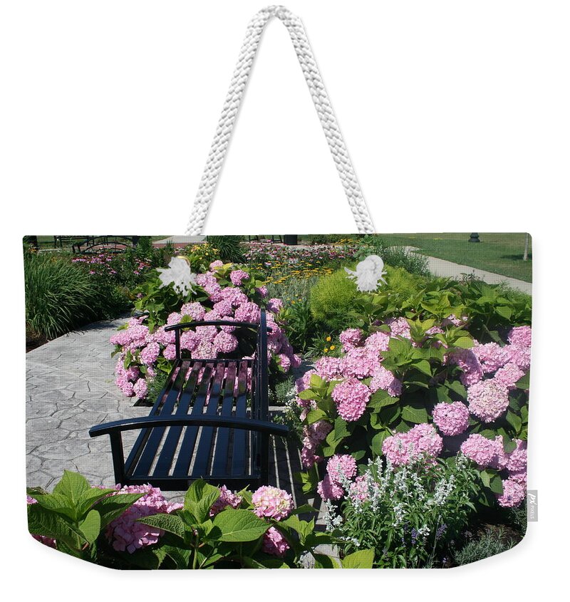 Garden Weekender Tote Bag featuring the photograph I Never Promised You A Rose Garden by Kay Novy