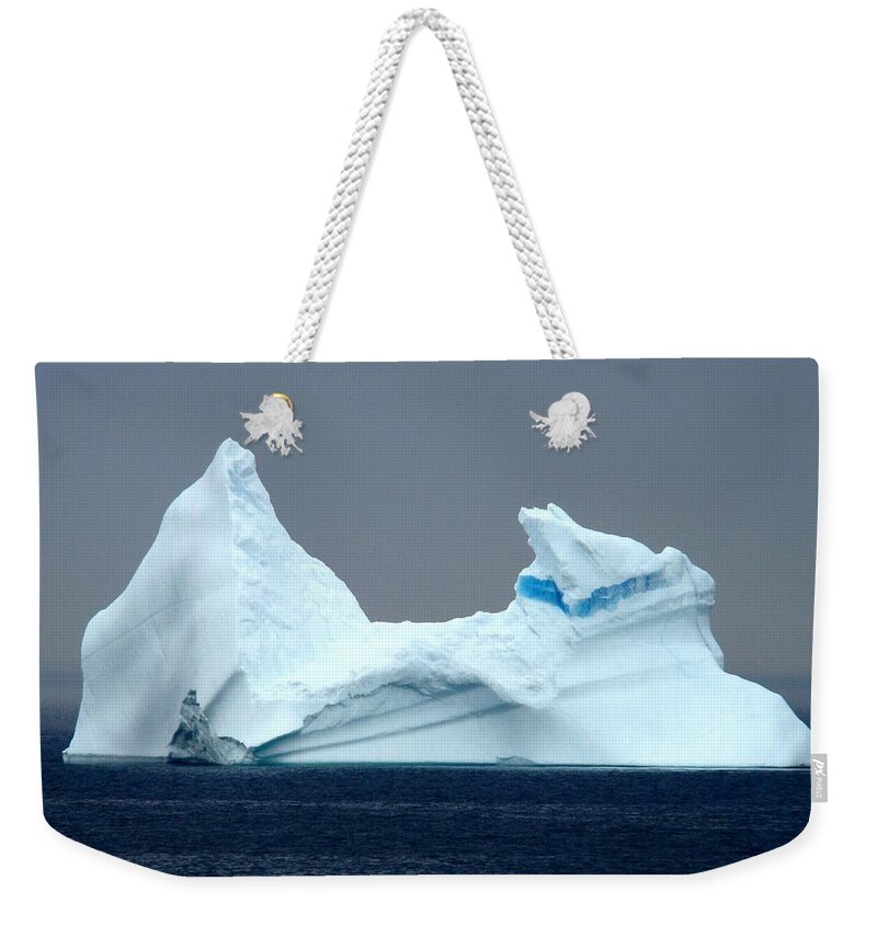 Icebergs Weekender Tote Bag featuring the photograph Iceberg in Newfoundland by Zinvolle Art