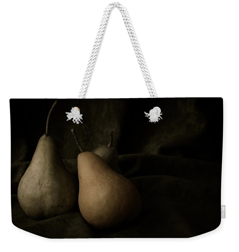 Pear Weekender Tote Bag featuring the photograph In Darkness by Amy Weiss